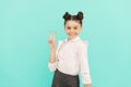 Peace maker. School age kid show V sign. Happy kid blue background. Basic education. Back to school Royalty Free Stock Photo