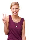 Peace, man. Studio portrait of an attractive young woman giving the peace sign isolated on white. Royalty Free Stock Photo