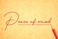 Peace Of Mind Signature Hand Written Text On yellow Texture Paper With Red pencil Underline The Phrase. Grunge Textured vintage