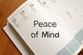 Peace of mind write on notebook Royalty Free Stock Photo