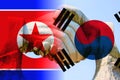 Peace between north and south korea with handshake