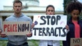 Peace now and stop terracts, people holding signs, protest against terrorism Royalty Free Stock Photo