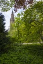 Peace Palace behind a woodland, Vredespaleis, under a pure gradient blue sky, seat of the ICJ, International Court of Justice, Royalty Free Stock Photo
