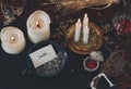 Peace of paper with words I wish written on it, put in cast iron candle holder with ashes in it, on wiccan witch altar. Royalty Free Stock Photo
