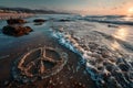 Peace sign drawn in sand on a beach with waves gently approaching Royalty Free Stock Photo