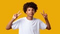 Peace sign ethnic tolerance relaxed african boy