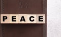 Peace Spelled in Blocks on a Leather Holy Bible