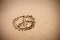 Peace symbol on the sand beach Royalty Free Stock Photo