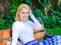 Peace and tranquility. Why you deserve break. Woman blonde take break relaxing in park. Girl sit bench relaxing in Royalty Free Stock Photo