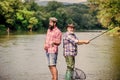 Peaceful activity. Nice catch. Rod and tackle. Fisherman fishing equipment. Fisherman grandpa and mature man friends Royalty Free Stock Photo