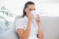 Peaceful attractive woman drinking coffee