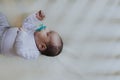 Peaceful baby sleeping in a crib