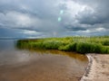 Peaceful beach dunegrass and storm clouds