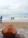 The atmosphere of Kuta beach in Bali and the freshness of young coconut water Royalty Free Stock Photo