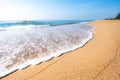 A peaceful beach scene in Thailand, exotic tropical beach landscapes and blue sea under a blue background. Relaxing summer holiday Royalty Free Stock Photo