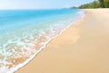 A peaceful beach scene in Thailand, exotic tropical beach landscapes and blue sea under a blue background. Relaxing summer holiday