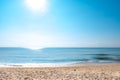 A peaceful beach scene in Thailand, exotic tropical beach landscapes and blue sea under a blue background. Relaxing summer holiday Royalty Free Stock Photo