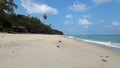 Peaceful beach in Thailand,blue sky, blue water , white sand and green mountain Royalty Free Stock Photo