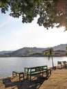 Peaceful Blue Lake Mountain with Table and Chair