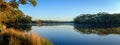 A peaceful calm misty Sun rise at Lake Tabourie, New South Wales, Australia