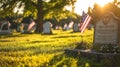 Peaceful cemetery at sunset honoring veterans with american flags Royalty Free Stock Photo