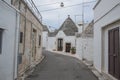 Peaceful corner of Alberobello street, famous historic site, no people