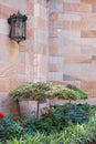 Peaceful corner garden with sandstone walls