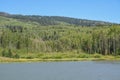The peaceful Freeman Reservoir below the mountainside of the Routt National Forests. In the Rocky mountains of Colorado