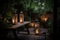 peaceful garden with soft candlelight and lanterns on a warm summer night Royalty Free Stock Photo