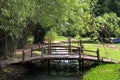Peaceful garden with wooden bridges in countryside of Thailand