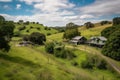 peaceful hilltop with view of rolling hills, farmhouses, and pastures