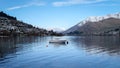 Peaceful idyllic image of boat docked in the Queenstown Wakatipu Lake, New Zealand Royalty Free Stock Photo