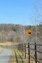 Peaceful image of biking path through the woods Royalty Free Stock Photo