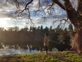 Peaceful image of a person deep thinking in natural landscape Royalty Free Stock Photo