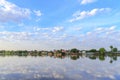 Peaceful Kamphaeng Phet town waterfront on Ping River with reflection