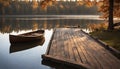 A peaceful lakeside scene with a wooden dock and a rowboat