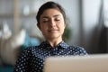 Millennial Indian woman relax at workplace taking nap Royalty Free Stock Photo