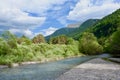 Peaceful mountain landscape with river during summertime on the Spanish side of Pyrenees mountain range, Spain Royalty Free Stock Photo