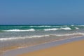 Peaceful ocean wave at beach. Smooth sand
