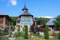 Orthodox church - Monastery Bujoreni, landmark attraction in Romania. Spring landscape