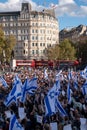 Crowds waving Israeli flags at pro-Israel solidarity rally at Trafalgar Square in London, UK