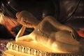 Peaceful reclining marble Buddha statue Royalty Free Stock Photo