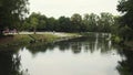 Peaceful river `Lippe` through the central city park during summer day in Lippstadt, Germany