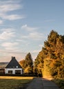 Peaceful rural cottage in autumn scenery