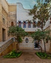 Peaceful sanctuary in Prince Naguib Palace, Cairo, Egypt. Lush greenery, elegant architecture