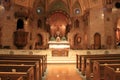 Peaceful scene with empty pews in front of alter, Holy Ghost Catholic Church,downtown Denver,2015 Royalty Free Stock Photo