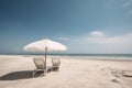 peaceful scene with two beach chairs and umbrellas overlooking the calm ocean Royalty Free Stock Photo