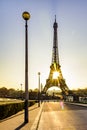 Peaceful sidewalk and sunrise over Paris