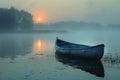 The peaceful solitude of a canoe on a misty lake at dawn Royalty Free Stock Photo