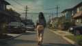 A Peaceful Stroll: Young Woman Embraces Serene Suburban Neighborhood